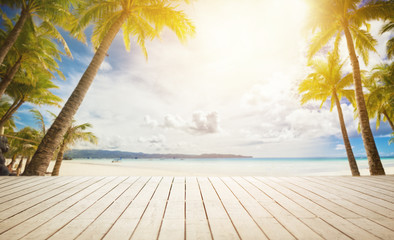 wooden dock with tropical background