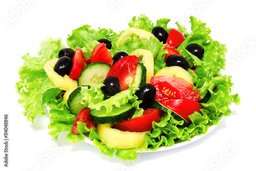 Fresh vegetable salad isolated on a white