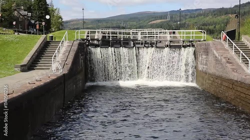 Water cascading through lock gates on the Caledonian Canal Fort Augustus Scotland UK by Loch Ness