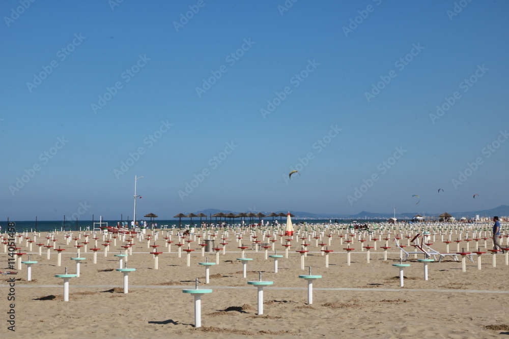 Empty sandy beach in Rimini on the Adriatic coast in the spring, Italy Empty sandy beach in Rimini on the Adriatic coast in the spring, Italy
