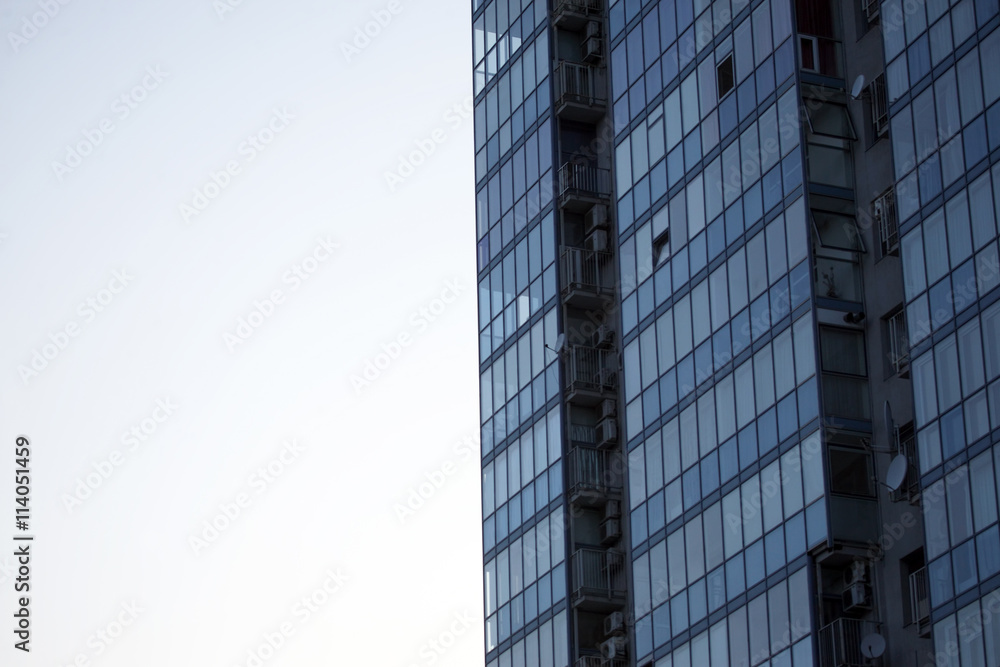 facade of apartment building against the sky facade of apartment building against the sky