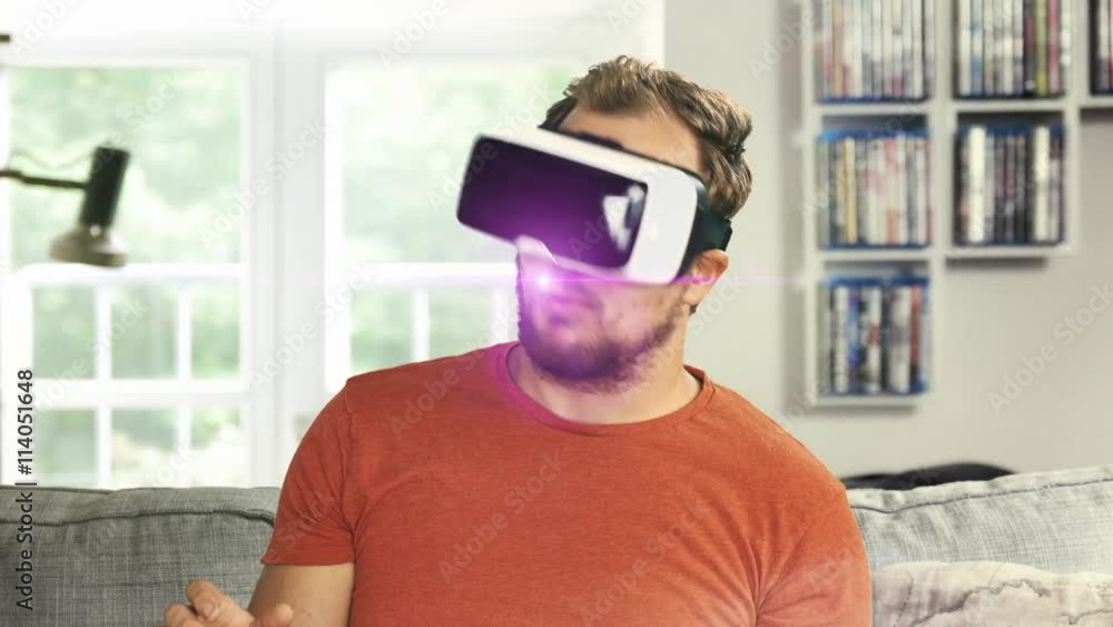 Young man wearing virtual reality googles / VR Glasses Young man wearing virtual reality googles / VR Glasses
