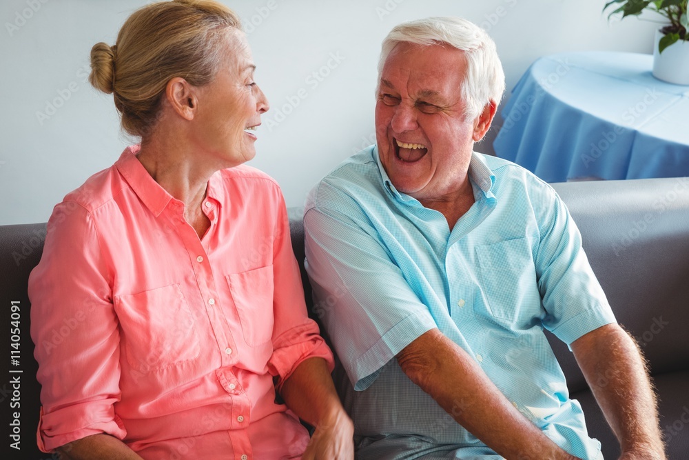 Senior couple laughing together Senior couple laughing together