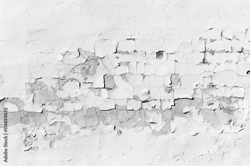 Obraz premium Concrete wall with peeling white paint, texture