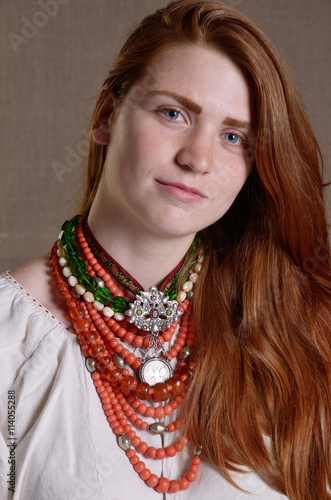 Ukrainian girl with the traditional jewelry photo