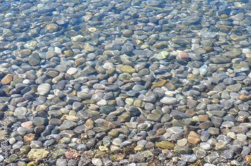 Natural Background, Stones Texture under a Transparent Sea Water
