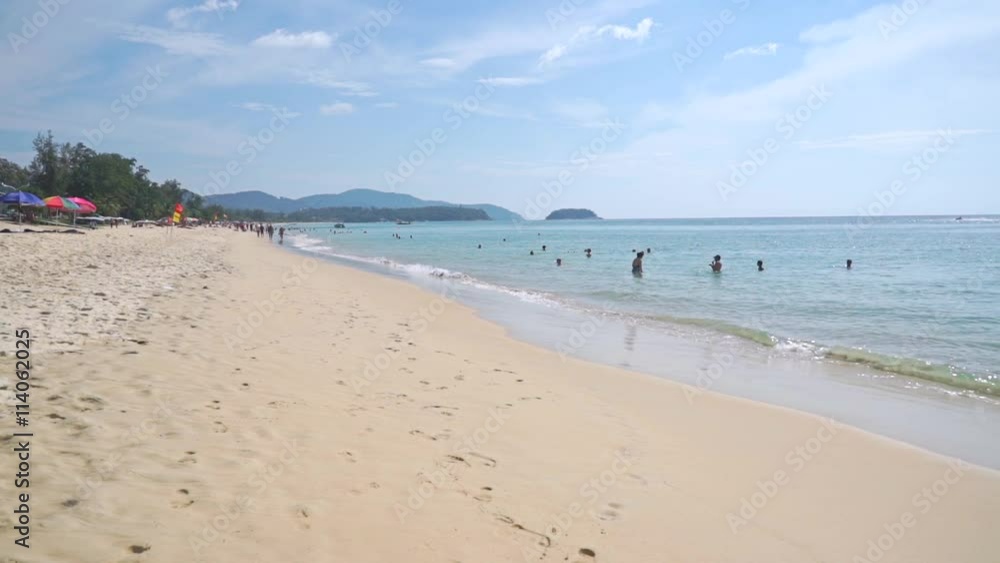 Unrecognizable people on Phuket beach, slow motion video Unrecognizable people on Phuket beach, slow motion video