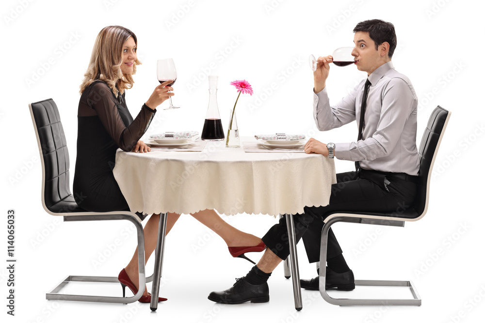 Woman touching a man under the table Woman touching a man under the table