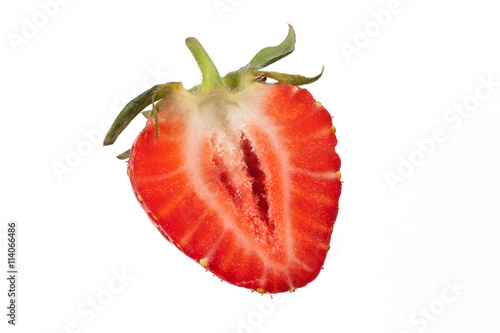 Half of strawberry isolated on white background
