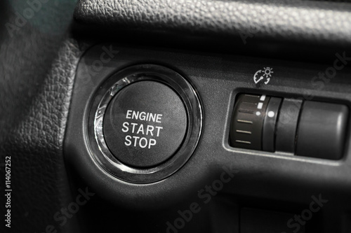 start stop engine buttons in car © comzeal