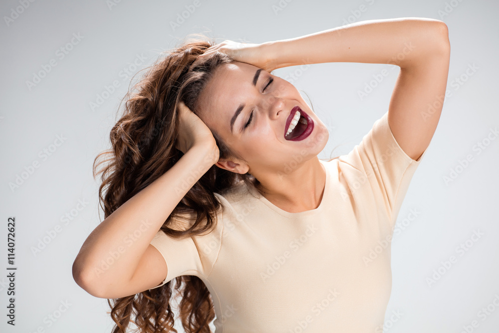 The young woman's portrait with pain emotions