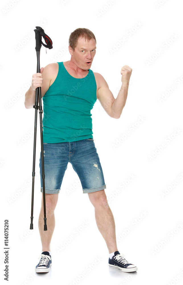Athletic 50 year old man in t-shirt and shorts , holding a folding Nordic walking sticks-Isolated on white background