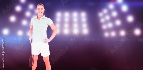 Pretty blonde playing badminton