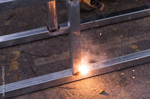 Arc welding of a steel at work site