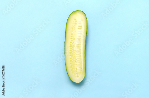Sliced ​​cucumber on a blue background