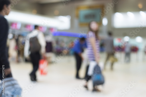Abstract blur of people in airport terminal