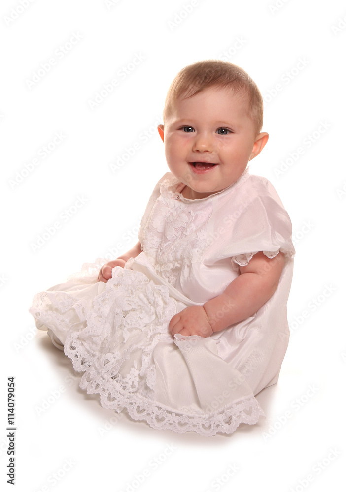 baby girl in a christening gown baby girl in a christening gown