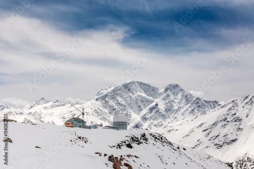 Panorama of the main Caucasus ridge and peak Terskol with Observatory in the foreground
