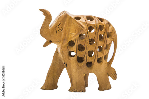 Photography Handmade wooden yellow elephant with holes on isolated background