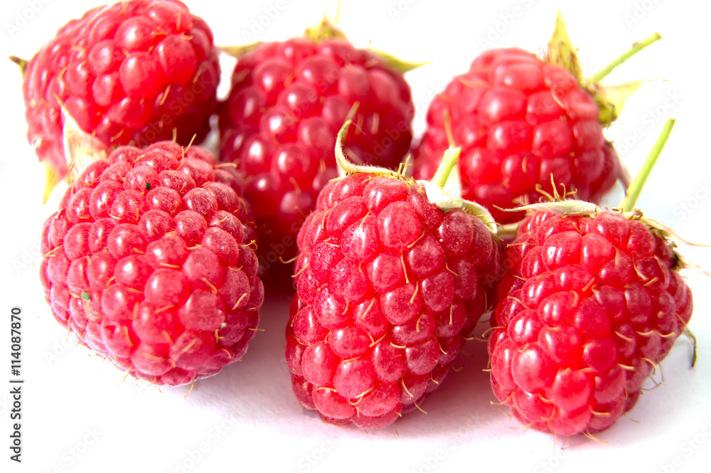 ripe raspberries isolated on white background close up ripe raspberries isolated on white background close up