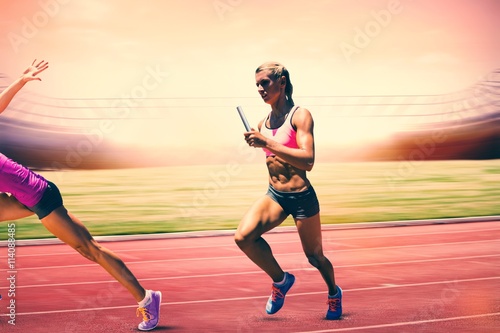 Composite image of athletic woman preparing to run