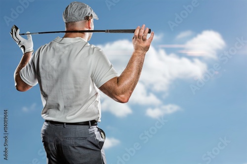 Composite image of rear view of golf player holding a golf club