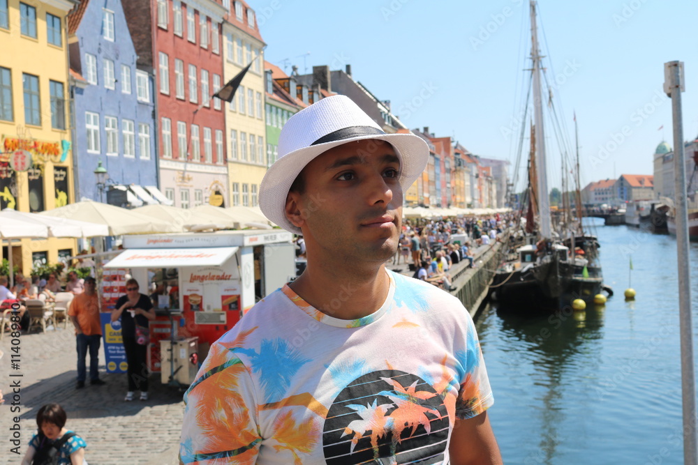 Man with hat on holiday in Copenhagen 