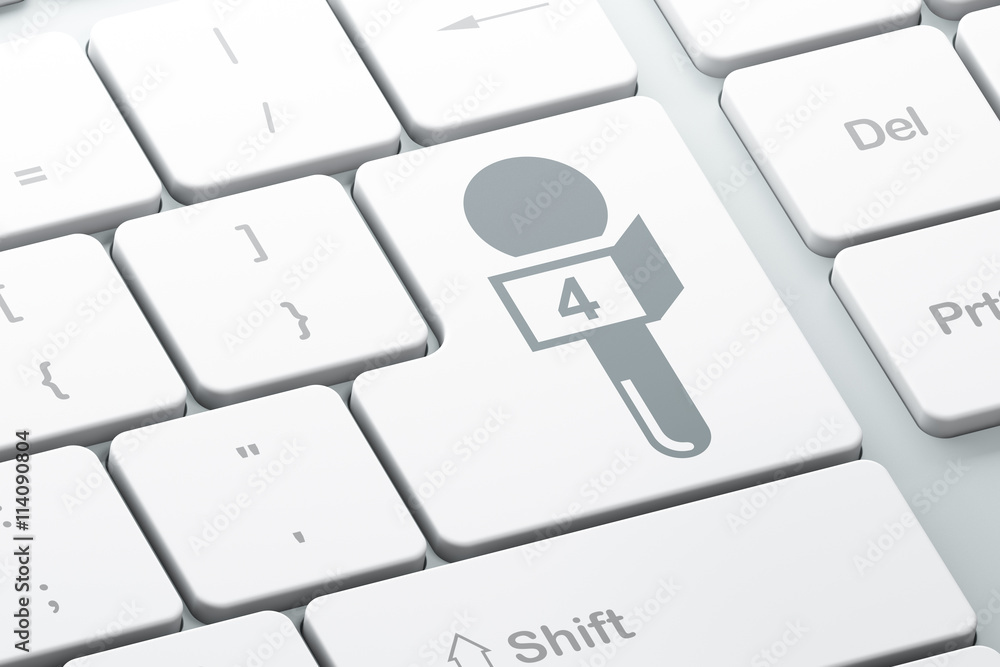 News concept: Microphone on computer keyboard background News concept: Microphone on computer keyboard background