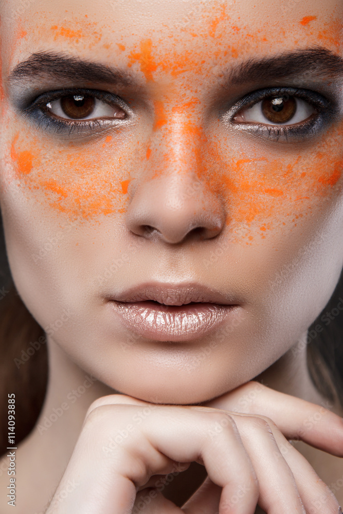 close up fashion portrait on gray background. art make up