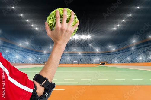 Sportswoman holding a ball 