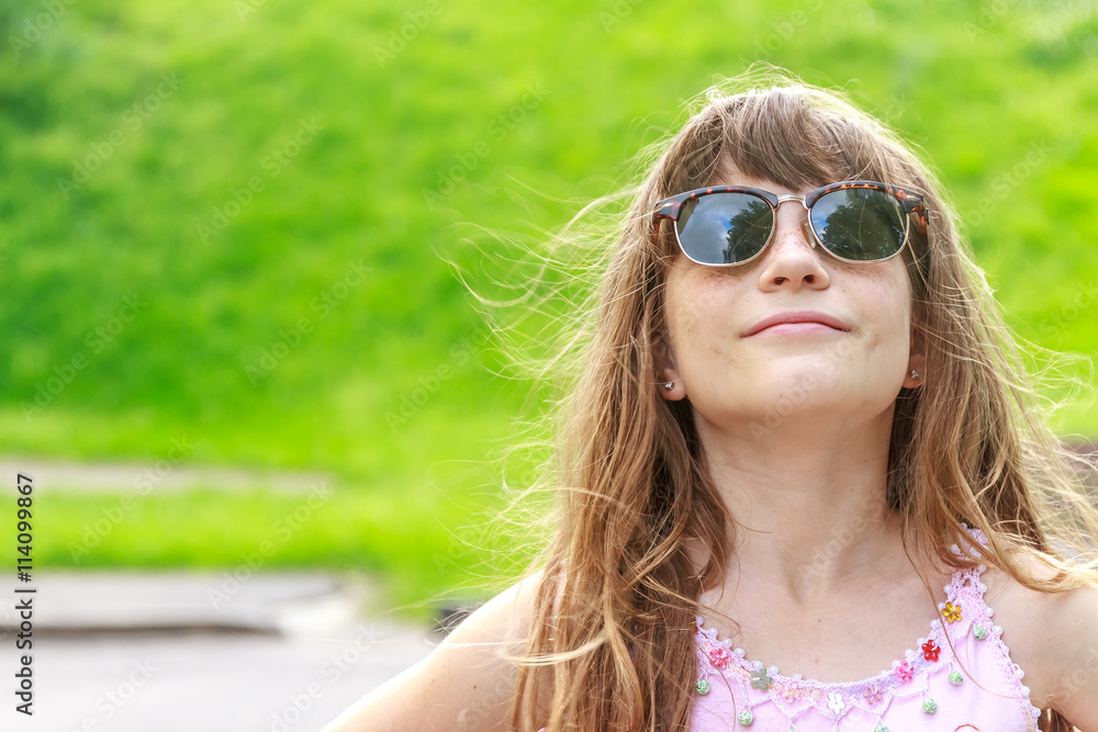 outdoor portrait of young child girl on natural background