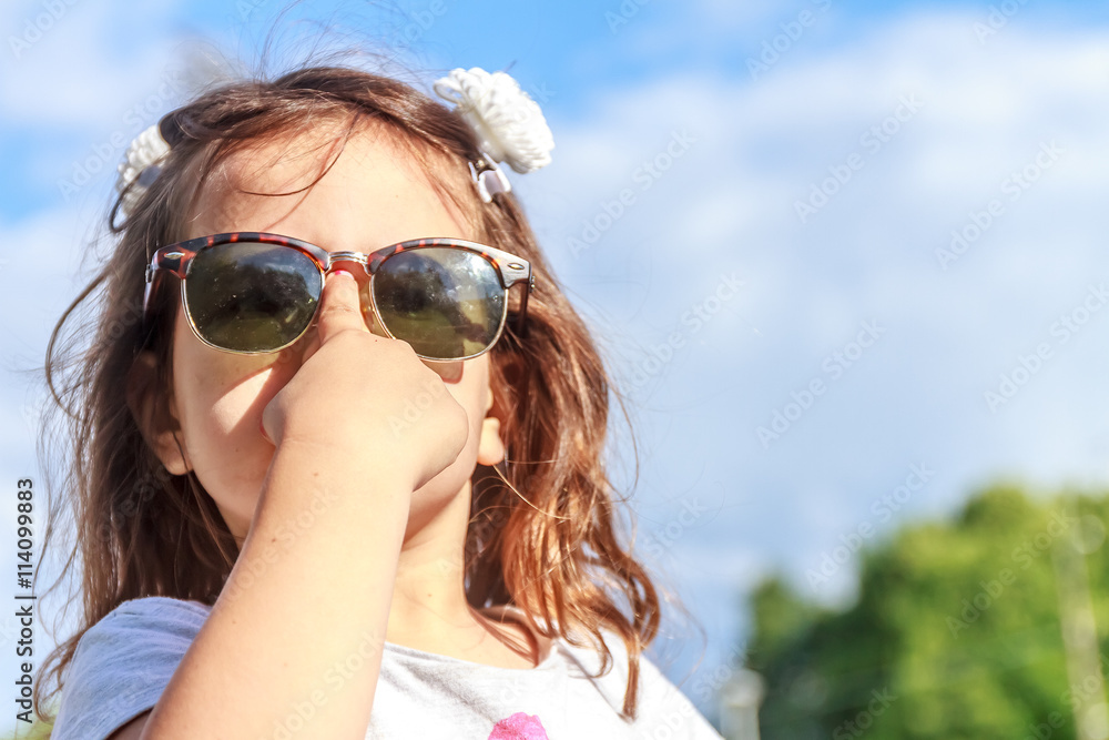 outdoor portrait of young child girl on natural background outdoor portrait of young child girl on natural background