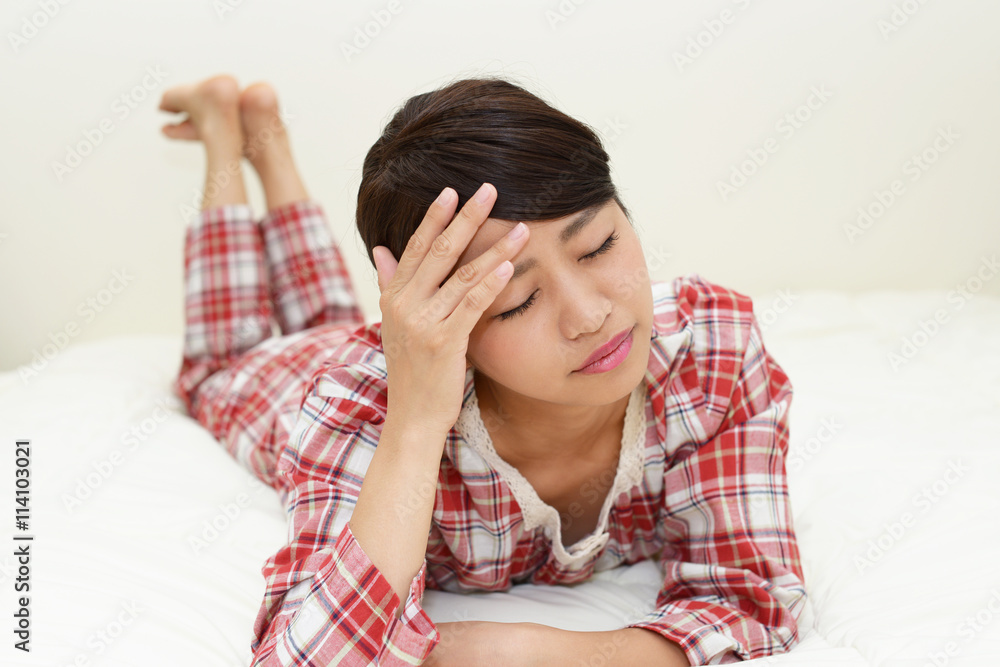 疲れた表情の女性 疲れた表情の女性