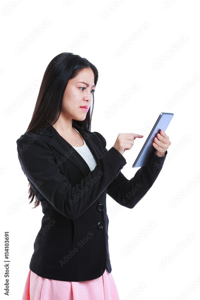 Businesswoman is in an angry mood with her digital tablet. Isolated on white. Businesswoman is in an angry mood with her digital tablet. Isolated on white.