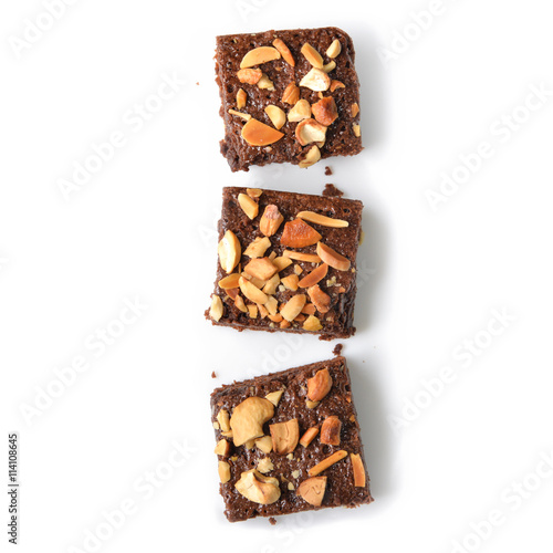Many pieces of brownie on white background - isolated