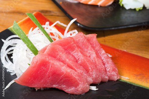 Japanese raw fish or sashimi served on a plate