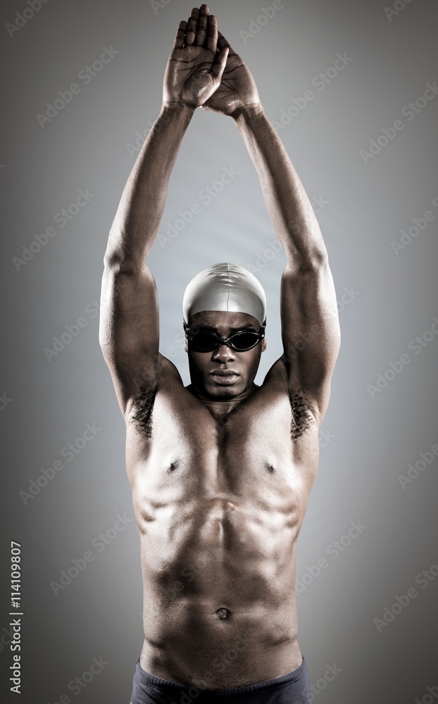 Composite image of swimmer ready to dive Composite image of swimmer ready to dive