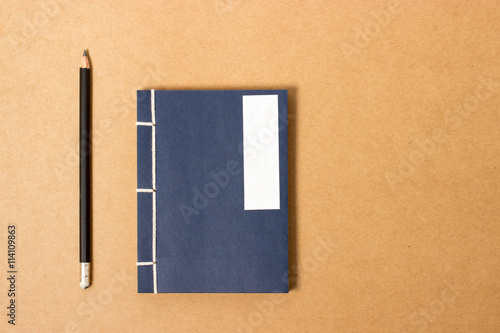 vintage notebook with pencil