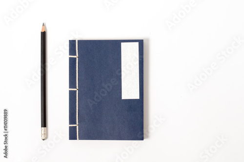 vintage notebook with pencil