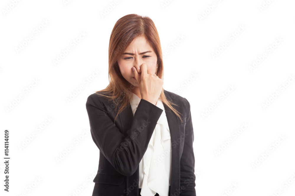 Young Asian woman holding her nose because of a bad smell Young Asian woman holding her nose because of a bad smell