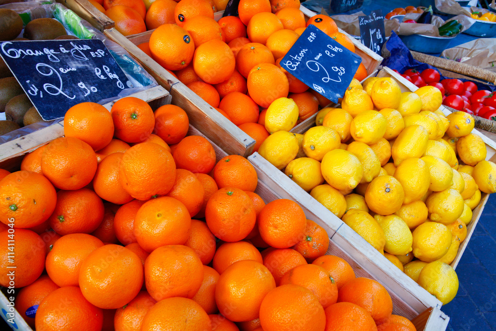 Nice, France - October 17, 2011: Juicy oranges and lemon, fresh citrus fruits