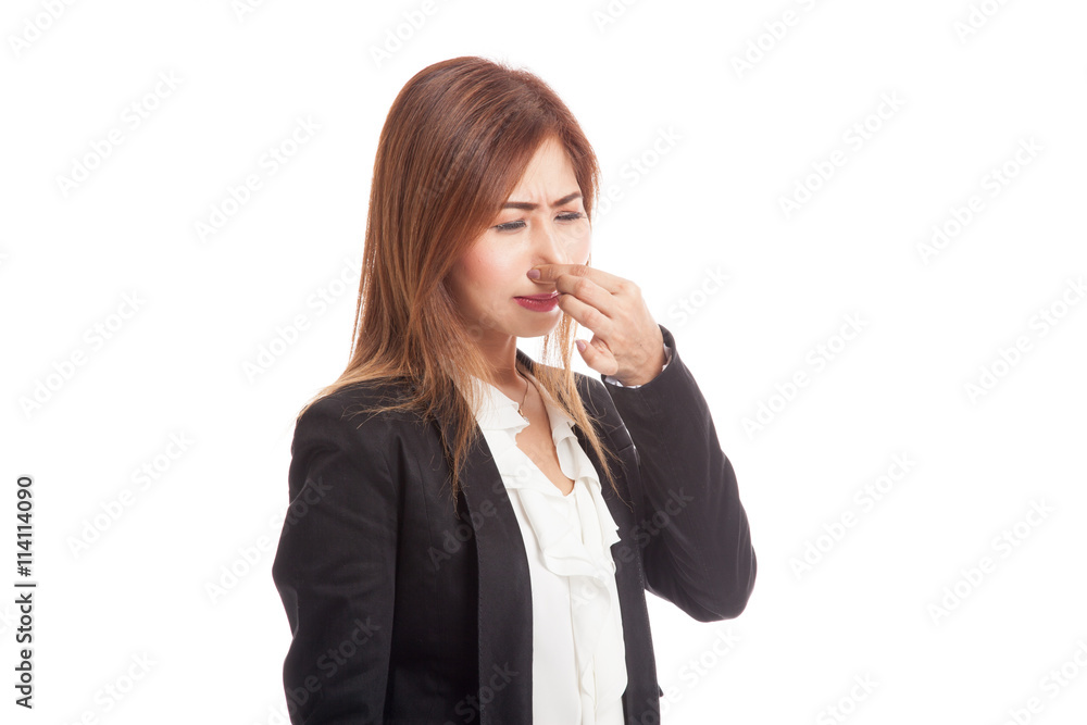 Young Asian woman holding her nose because of a bad smell Young Asian woman holding her nose because of a bad smell
