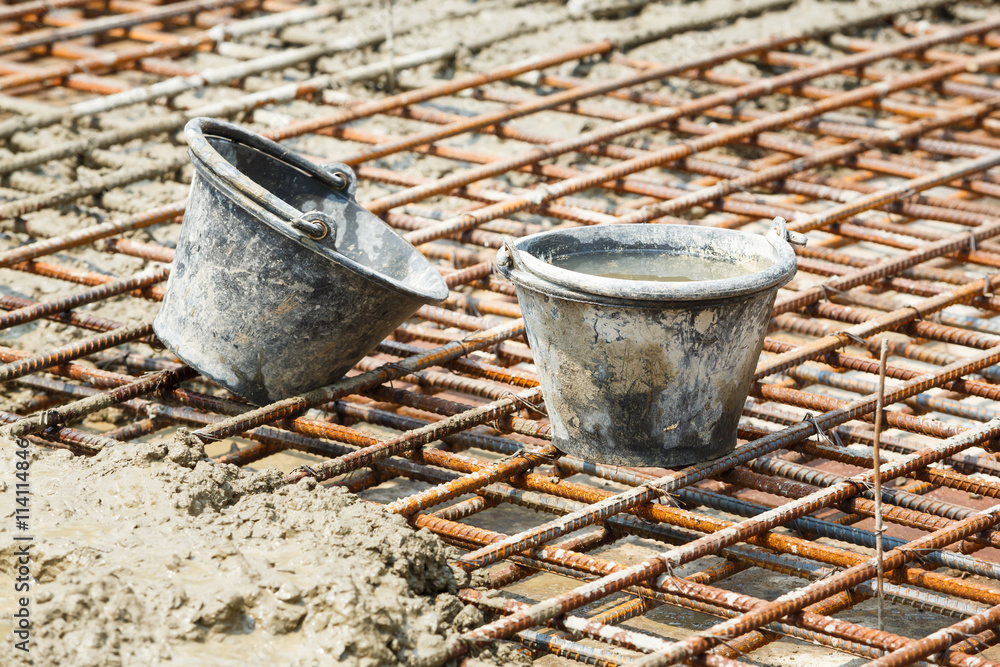 Dirty plastic bucket in construction site Dirty plastic bucket in construction site