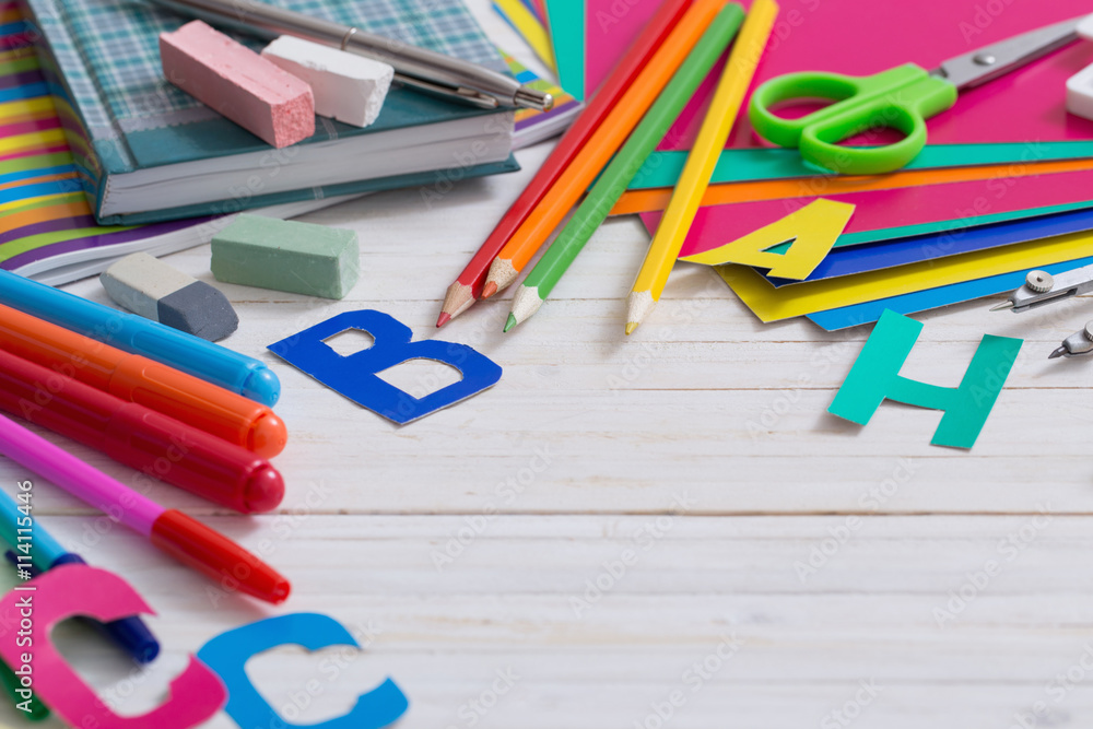 Fototapeta premium Back to school composition on white wooden background