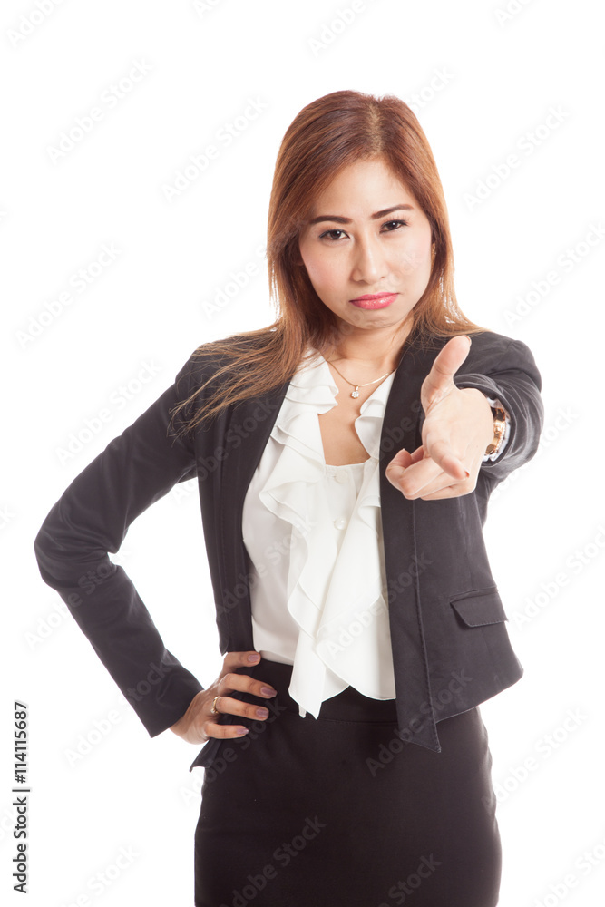 Young Asian business woman angry and point to camera Young Asian business woman angry and point to camera