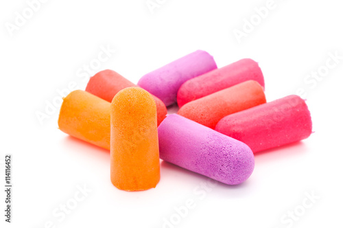 close-up ear plugs stoppers for protection against noise , isolated on a white background