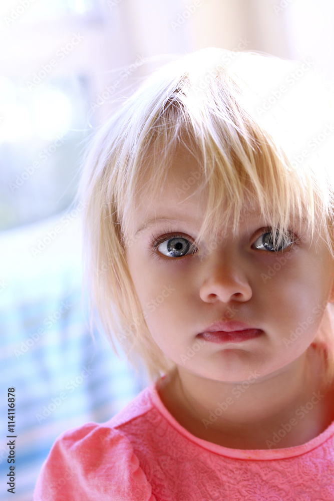 Portrait of the small beautiful girl with blue eyes Portrait of the small beautiful girl with blue eyes