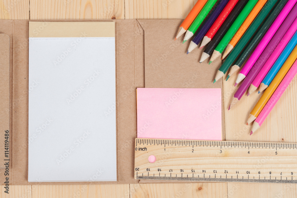 Colored pencils on a wooden Colored pencils on a wooden