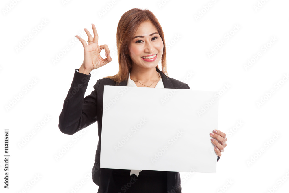 Young Asian business woman show OK with white blank sign Young Asian business woman show OK with white blank sign
