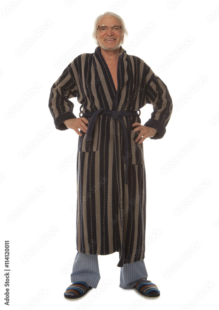Full length portrait of a relaxed senior man in a blue bathrobe